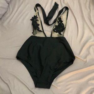 One piece swimsuit. NEVER WORN!